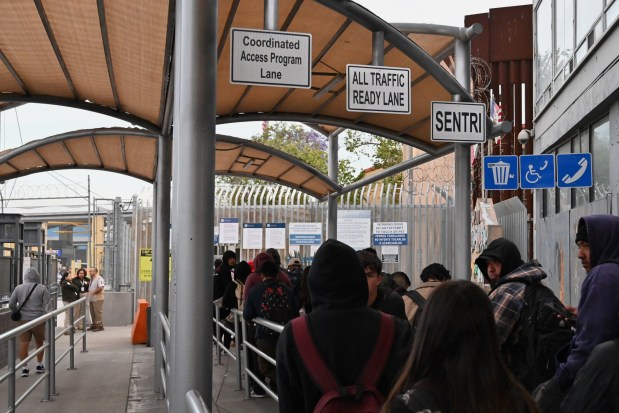 Expedited lanes for San Diego higher education students living in Mexico were open at the San Ysidro Port of Entry in Tijuana on Thursday, April 23, 2026 through the Coordinated Access Program Lane next to general traffic and SENTRI lanes at pedestrian border crossings. To use the lane college students must download a U.S. Customs and Border Protection app to sign up to join the free program offered to students crossing the border. (Carlos Moreno / The San Diego Union-Tribune)
