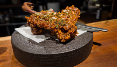 Japanese-style fried chicken leg, served with the claw still attached.