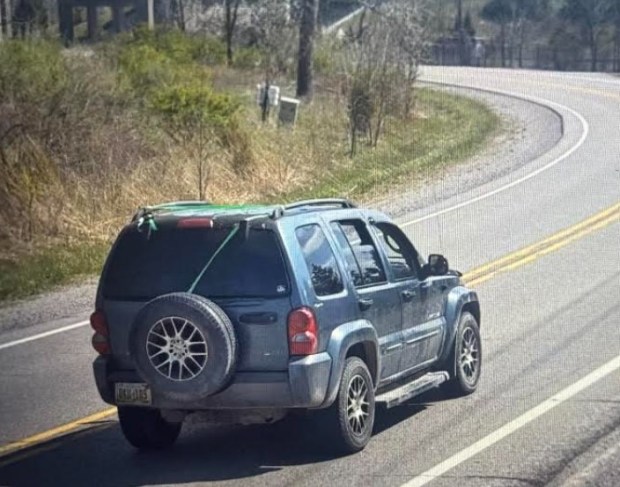 State Police said the missing girl may be in this blue 2002 Jeep Liberty being driven by Derek Girtman. (SCREEN SHOT)