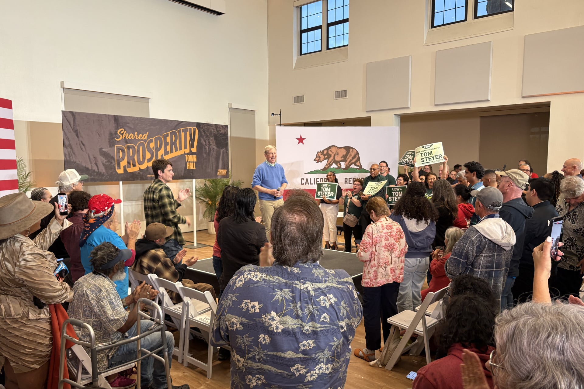 Billionaire Tom Steyer on stage in San Diego, California for his "Shared Prosperity" town hall tour on March 31, 2026.