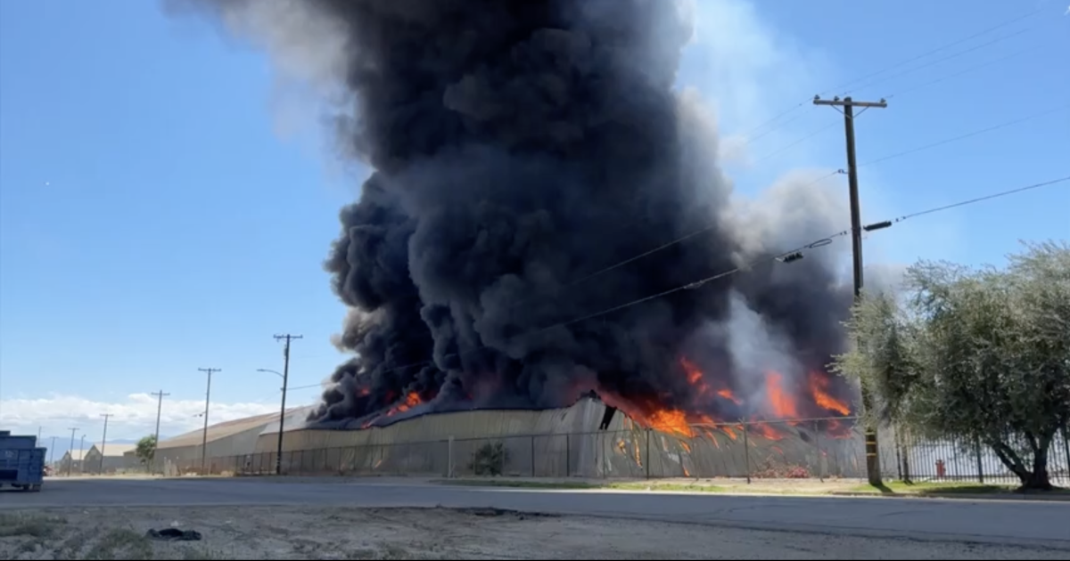 Firefighters battle active fire on Washington St. in East Bakersfield