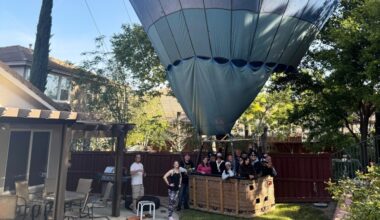 Hot air balloon with 13 people safely lands in California yard