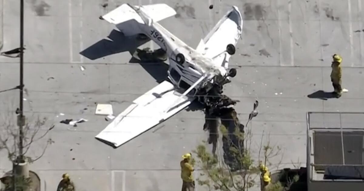 Plane crashes upside down in SoCal auto store parking lot, pilot hospitalized