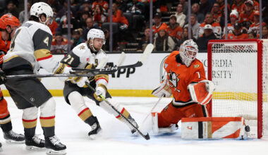 May 14, 2026; Anaheim, California, USA; Anaheim Ducks goaltender Lukas Dostal (1) makes a save as Vegas Golden Knights defenseman Rasmus Andersson (4) and center William Karlsson (71) look on during the first period in game six of the second round of the 2026 Stanley Cup Playoffs at Honda Center. Mandatory Credit: Kiyoshi Mio-Imagn Images