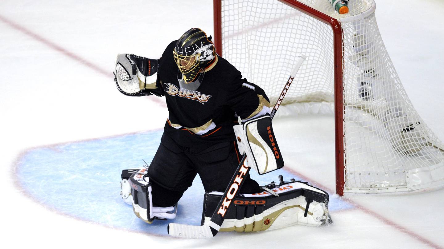 May 12, 2013; Anaheim, CA, USA; Anaheim Ducks goalie Jonas Hiller (1) blocks a shot against the Detroit Red Wings during the second period in game seven of the first round of the 2013 Stanley Cup Playoffs at the Honda Center. Mandatory Credit: Kelvin Kuo-Imagn Images