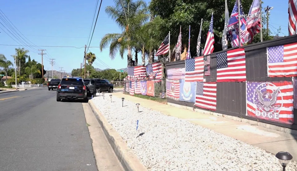 The Escondido home is covered with Trump flags and MAGA memorabilia. onscene.tv