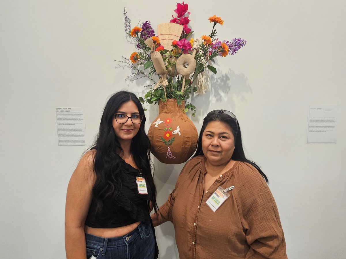 Iris Hernandez (left) and her mother Lorena Raya (right) run a custom piñata business. Their design reflects Hernandez and Raya’s shared journey, from coming to the U.S. and working different jobs, to their bond as mothers and women.