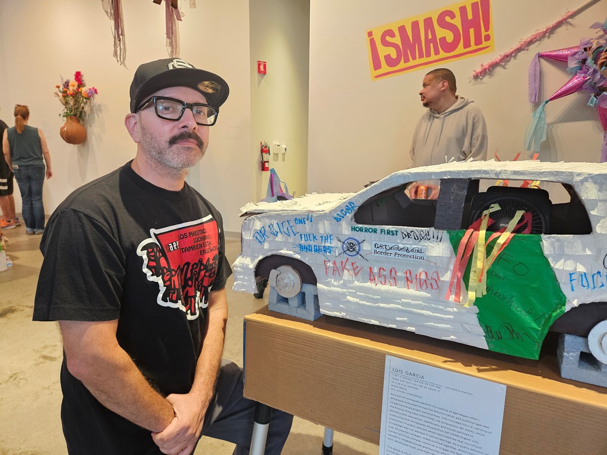 Luis Garcia said his piñata captures street aesthetics and is meant to be a symbol of resistance against federal crackdowns targeting Latino and immigrant communities. His piñata will not be smashed at the end of the exhibit.