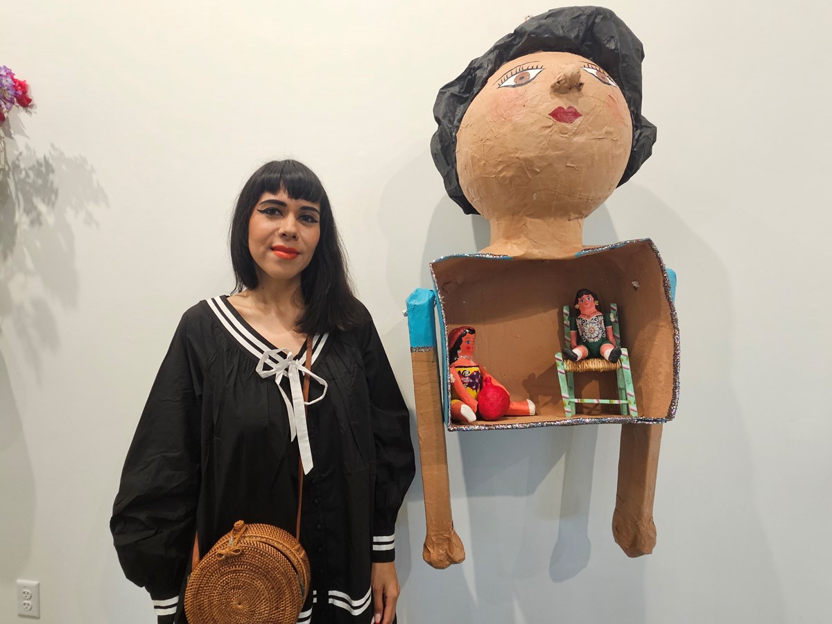 Ramona Garcia usually makes Lupita dolls out of papier-mache, and her piñata features two small Lupita dolls inside a larger one. She said the design is meant to symbolize preserving tradition and childhood.