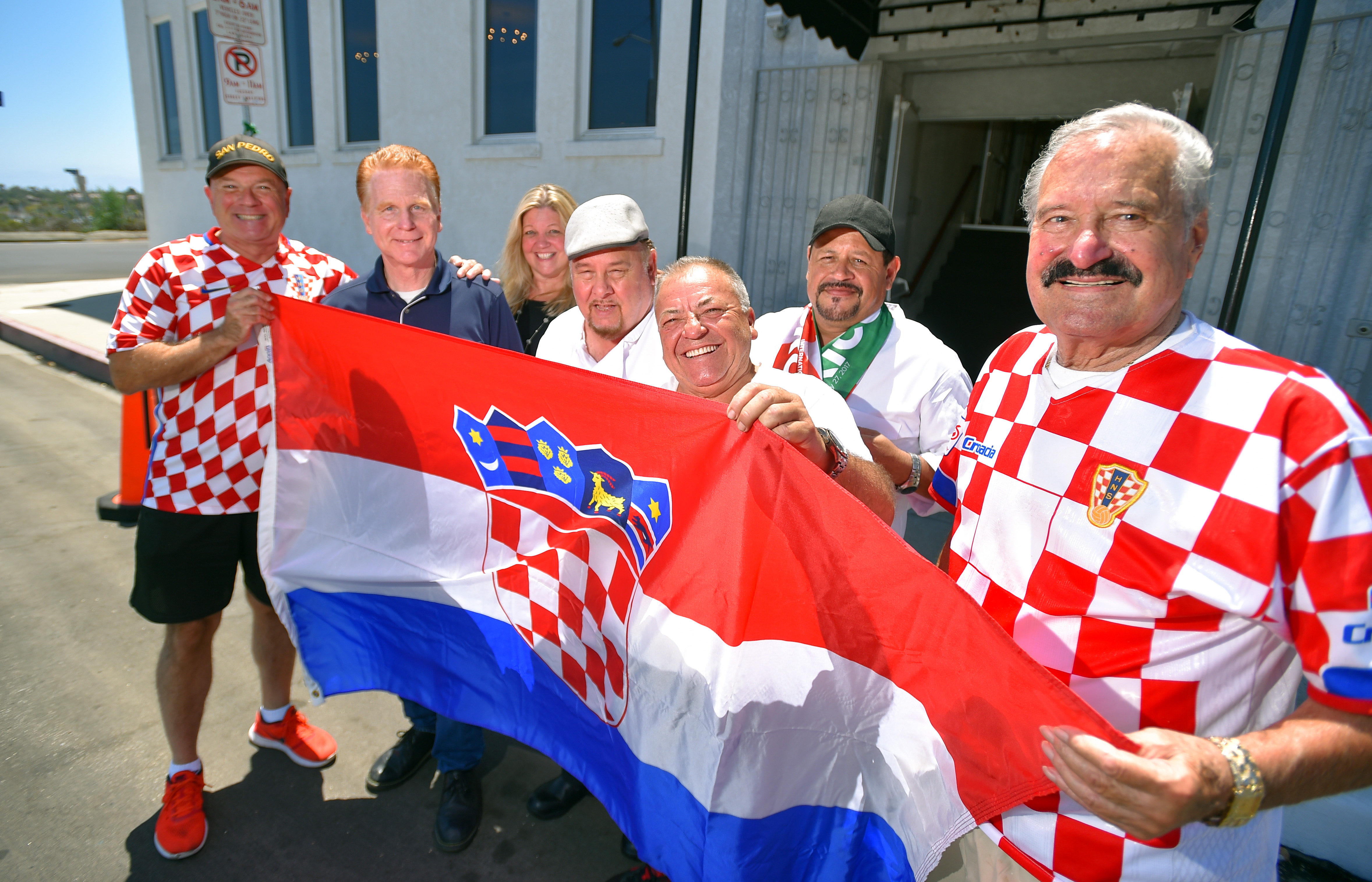 The crew at the Dalmatian-American Club are ready to cheer...