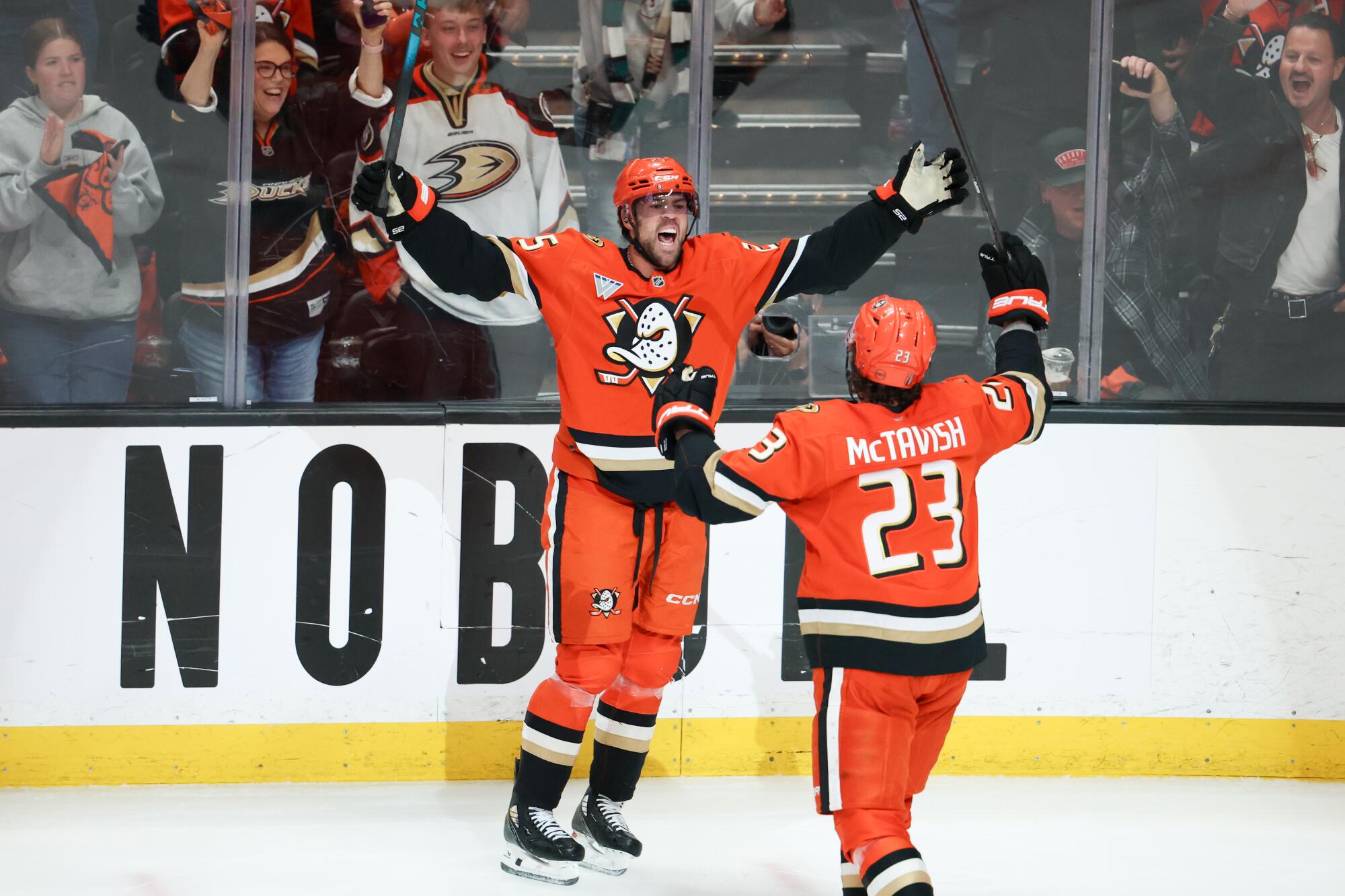 Ducks forward Ryan Poehling, left, celebrates with forward Mason McTavish after scoring in the first period.