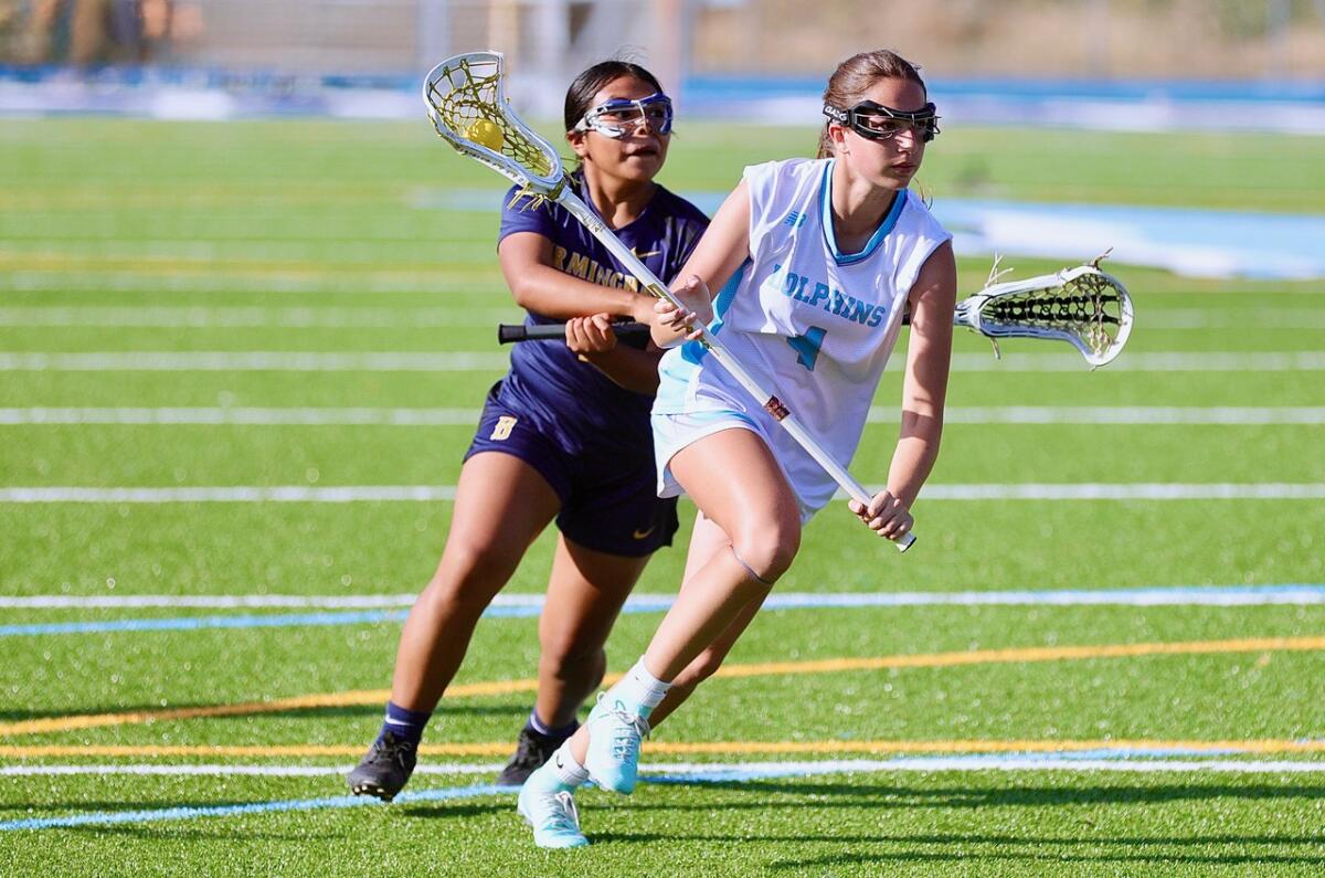 Palisades’ Emma Traister goes on the attack in the City Section girls lacrosse final against Birmingham. 