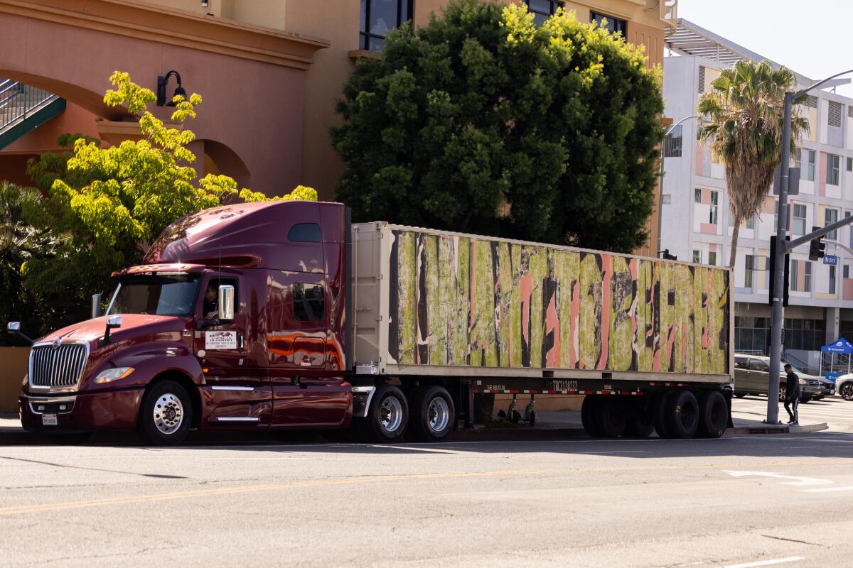 L.A.-based artist Edgar Ramirez’s art piece, “I want to be free.” on a painted shipping container in Hollywood on April 29.
