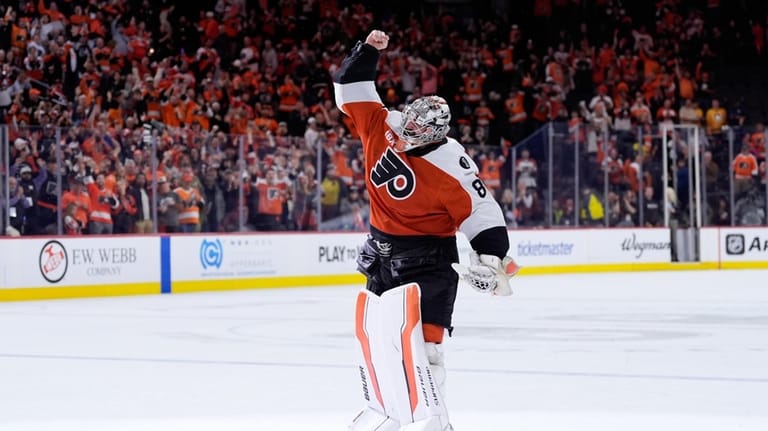 Philadelphia Flyers' Dan Vladar reacts after the Flyers won Game...