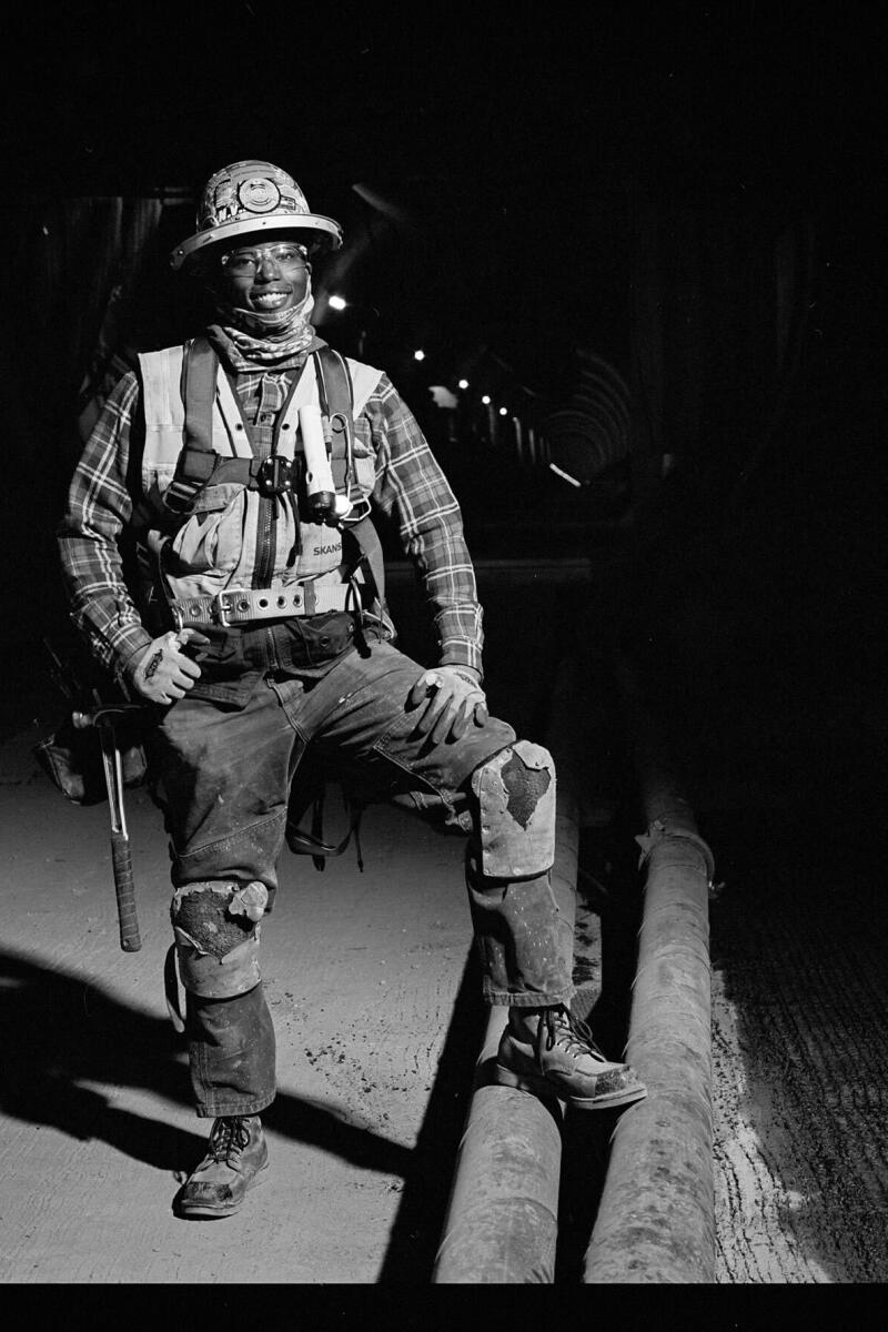 Carpenter Jenna Dorough poses for a portrait by Karagozian during the underground construction of the Metro D Line.