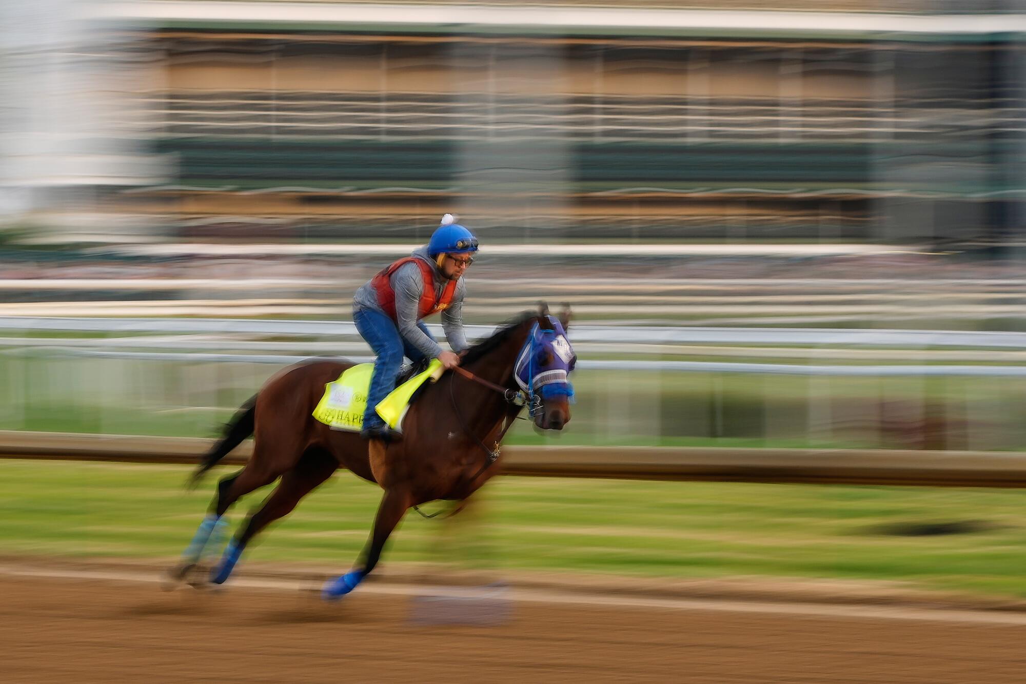Kentucky Derby entrant So Happy works out at Churchill Downs on Monday in Louisville, Ky. 