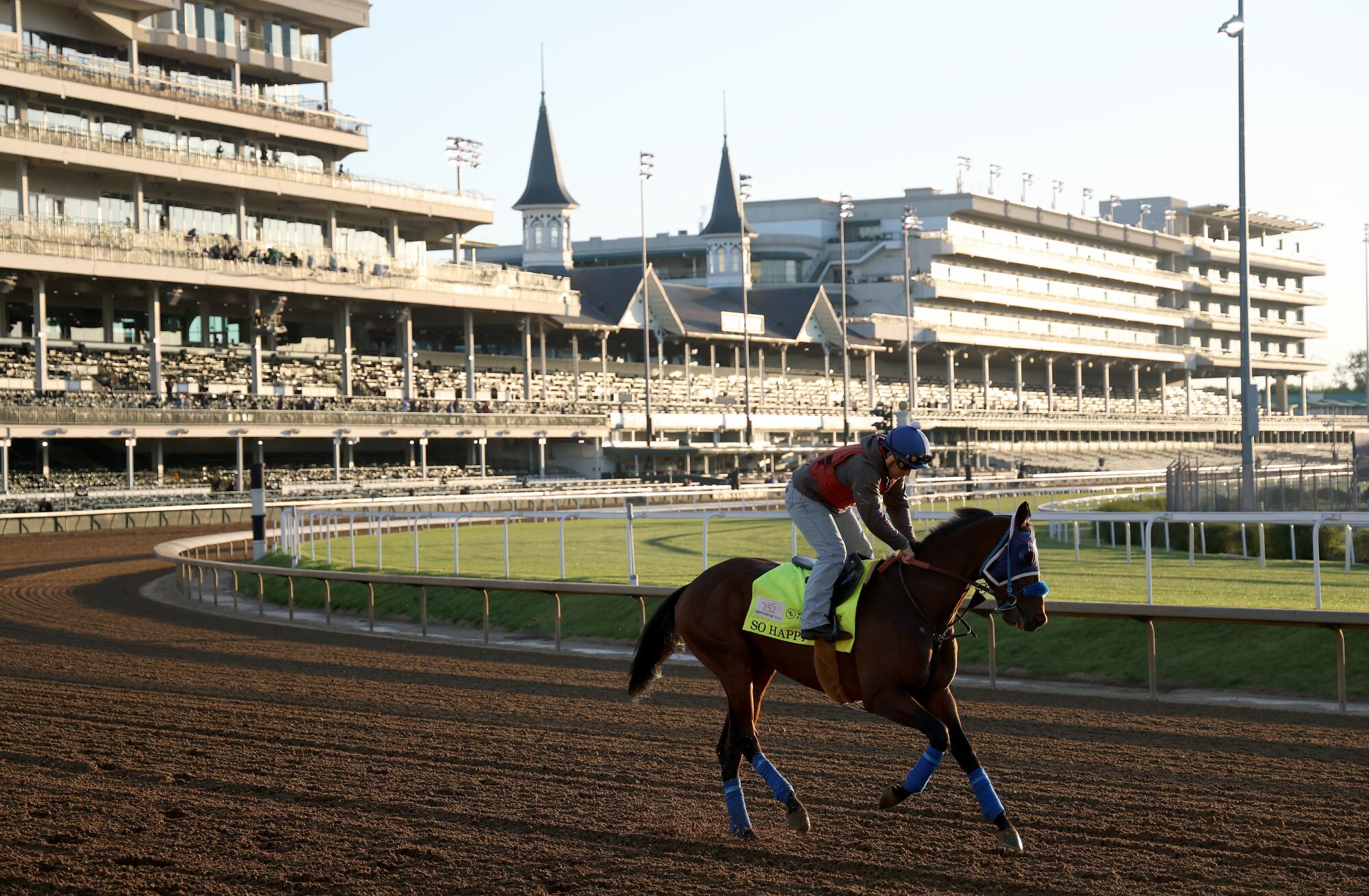 So Happy runs on the track during Kentucky Derby training Thursday at Churchill Downs in Louisville, Ky.