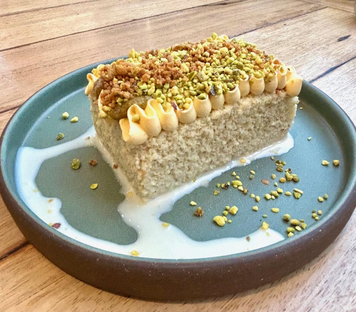 Moms are served complimentary Pistachio Tres Leches Cake at Puesto this Mother's Day.