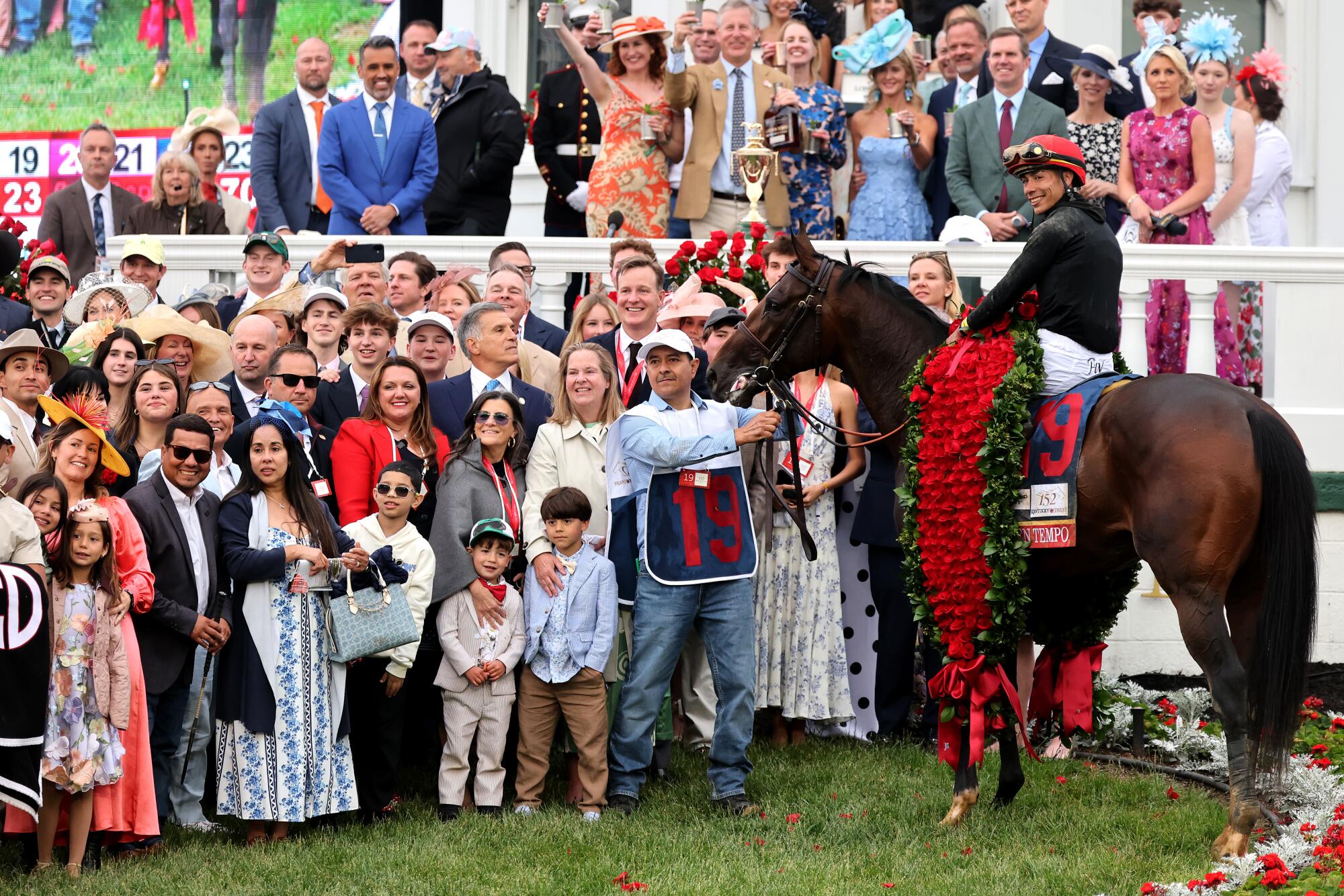 Golden Tempo's team of owners and support staff in the winner's circle at Churchill Downs on Saturday.