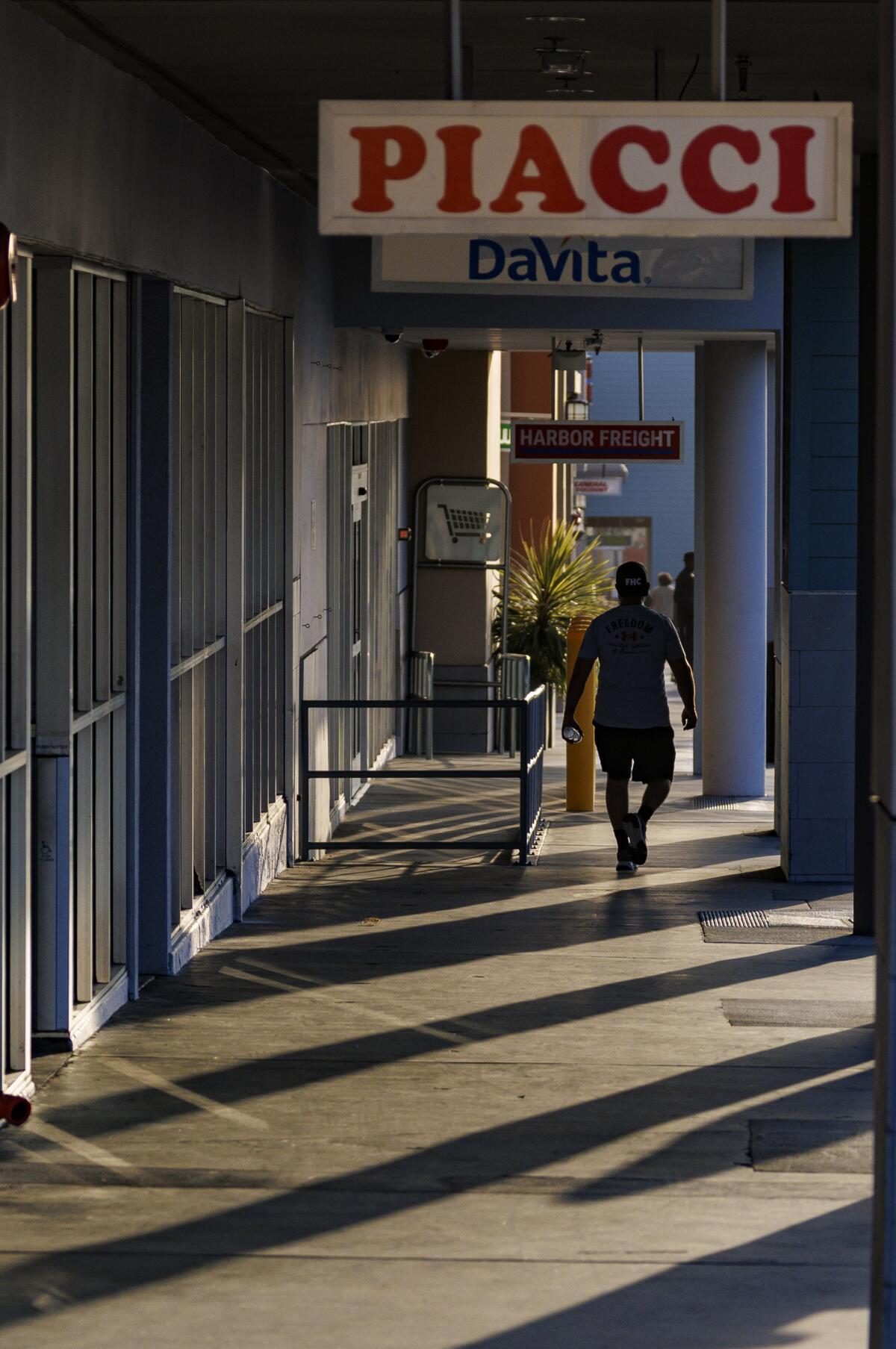 Nearly a year after ICE raids, Latino-owned shopping centers across the Southland remain plagued by depressed business. 