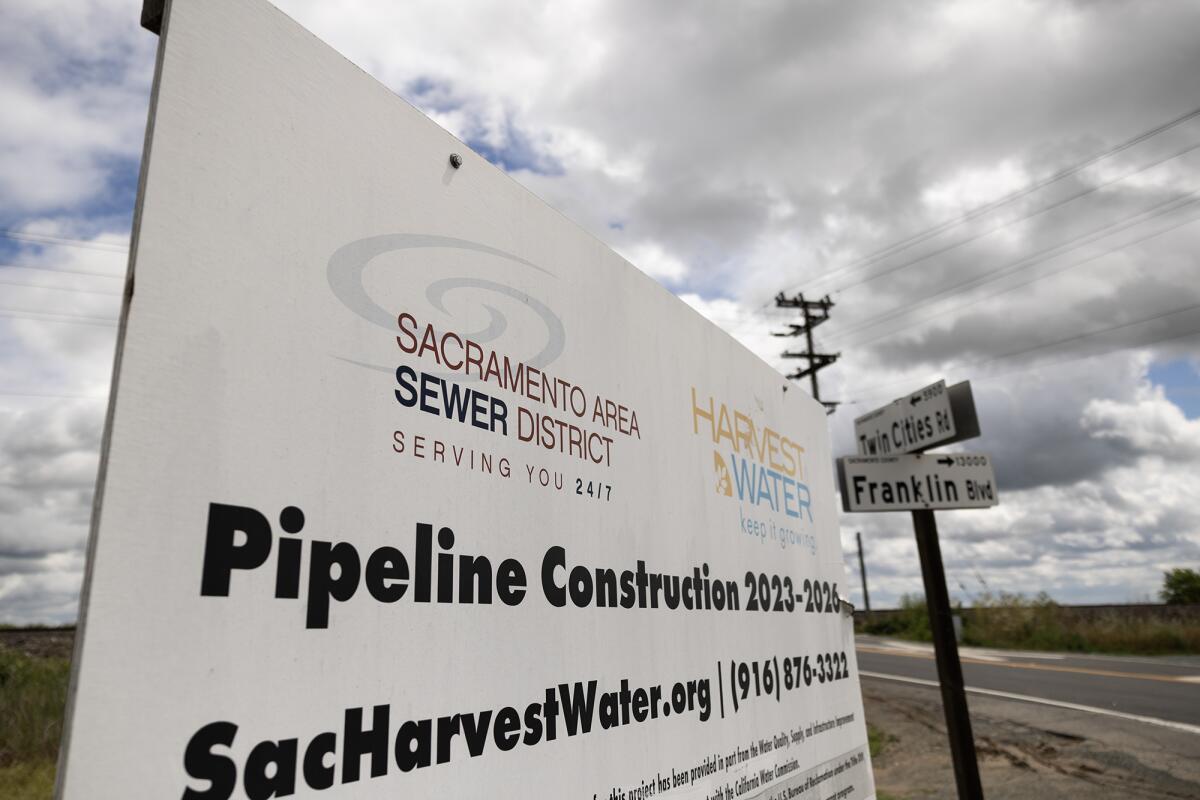 A roadside sign for the Sacramento Area Sewer District announces “Pipeline Construction 2023–2026.”