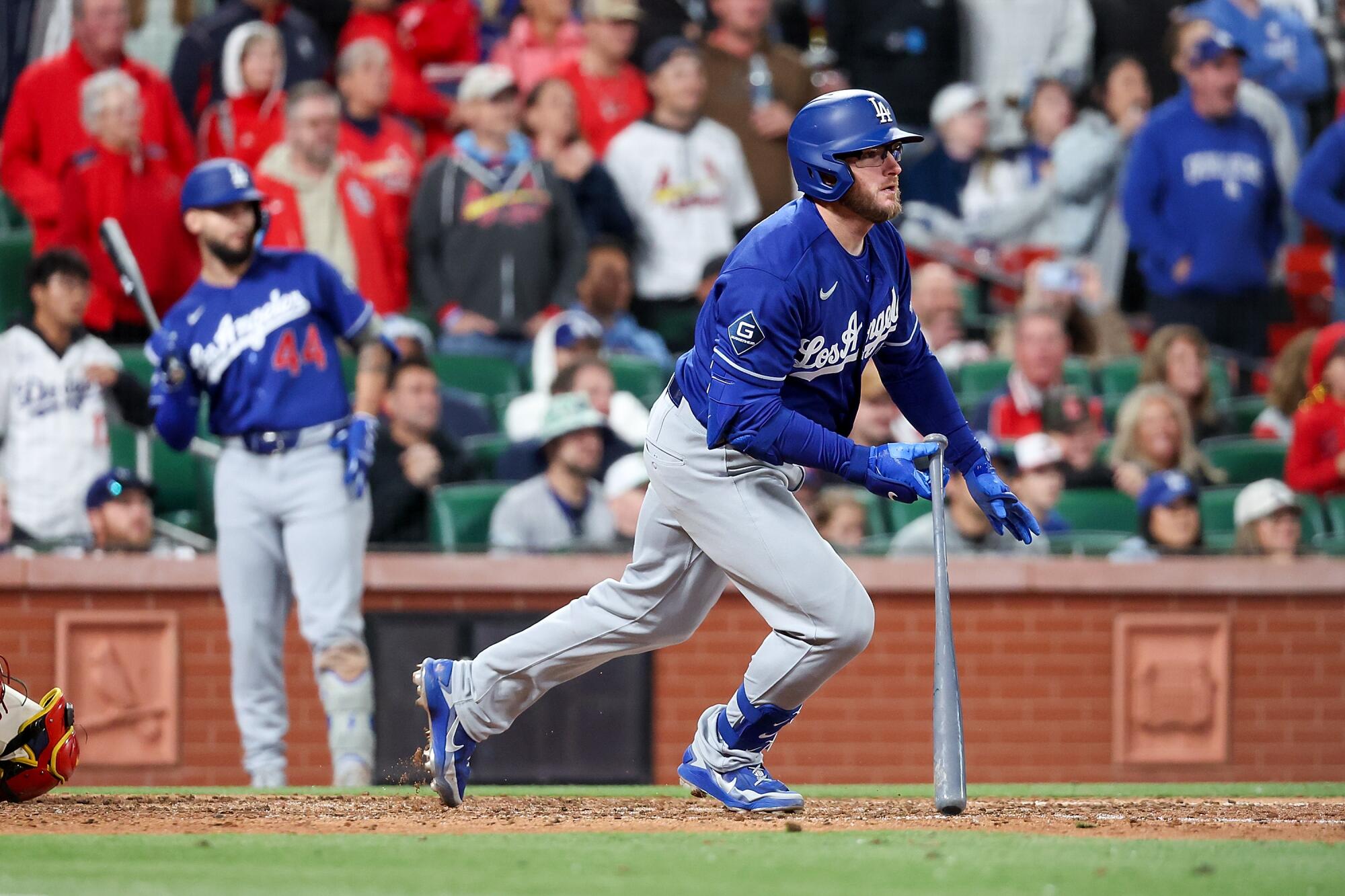 The Dodgers' Max Muncy runs for an RBI single during the ninth inning against the Cardinals on Saturday in St. Louis. 