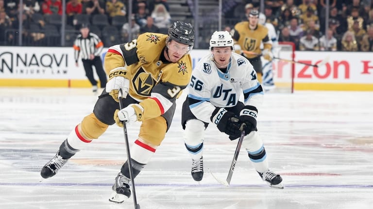 Vegas Golden Knights defenseman Brayden McNabb (3) and Utah Mammoth...