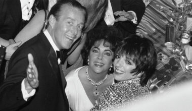 New York, New York, USA - May 7, 1981: Fashion designer, Halston, actress Elizabeth Taylor and singer and actress Liza Minnelli smile at the opening night party for the Broadway revival of the play 'The Little Foxes.'