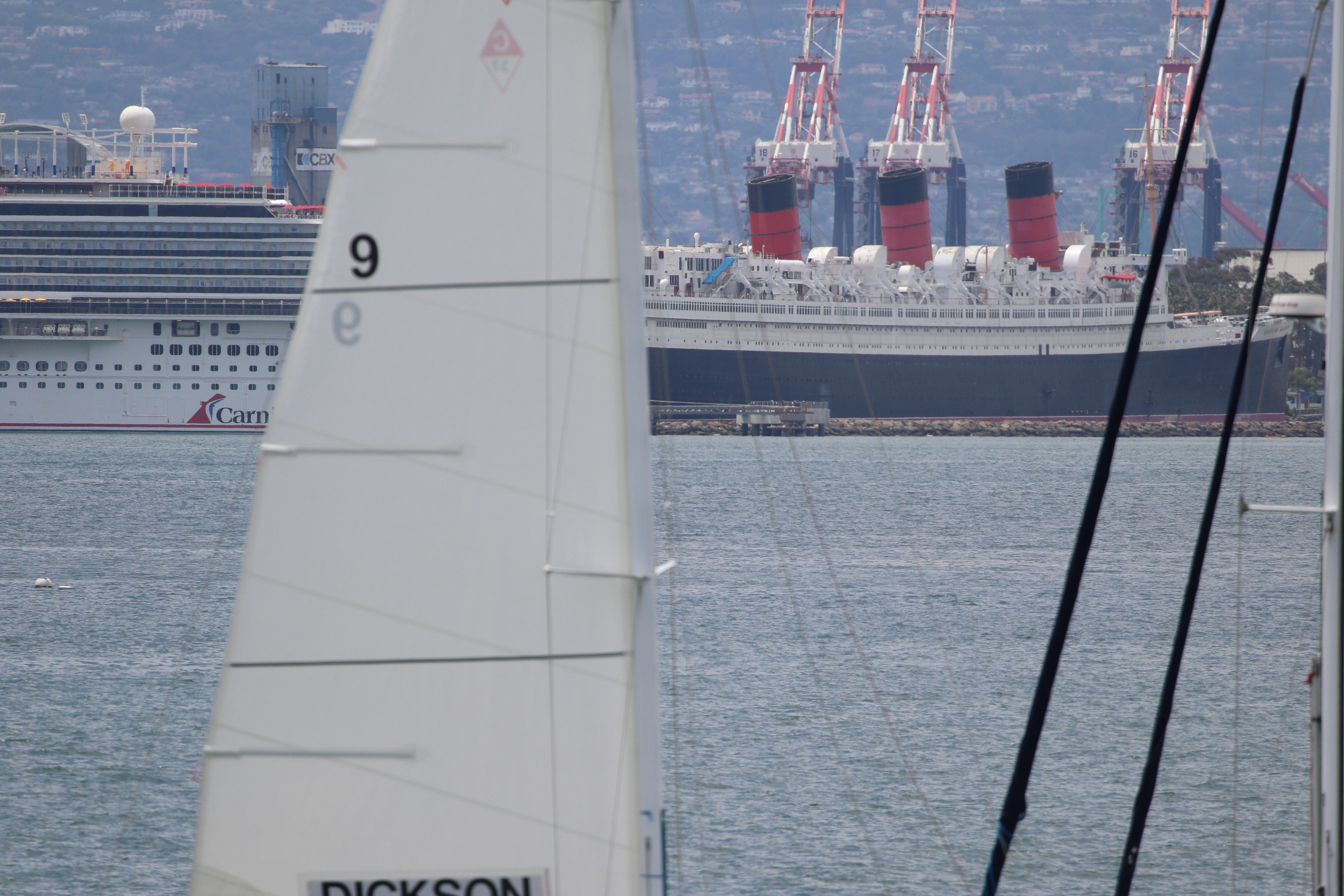 The Queen Mary and a cruise ship are visible in...