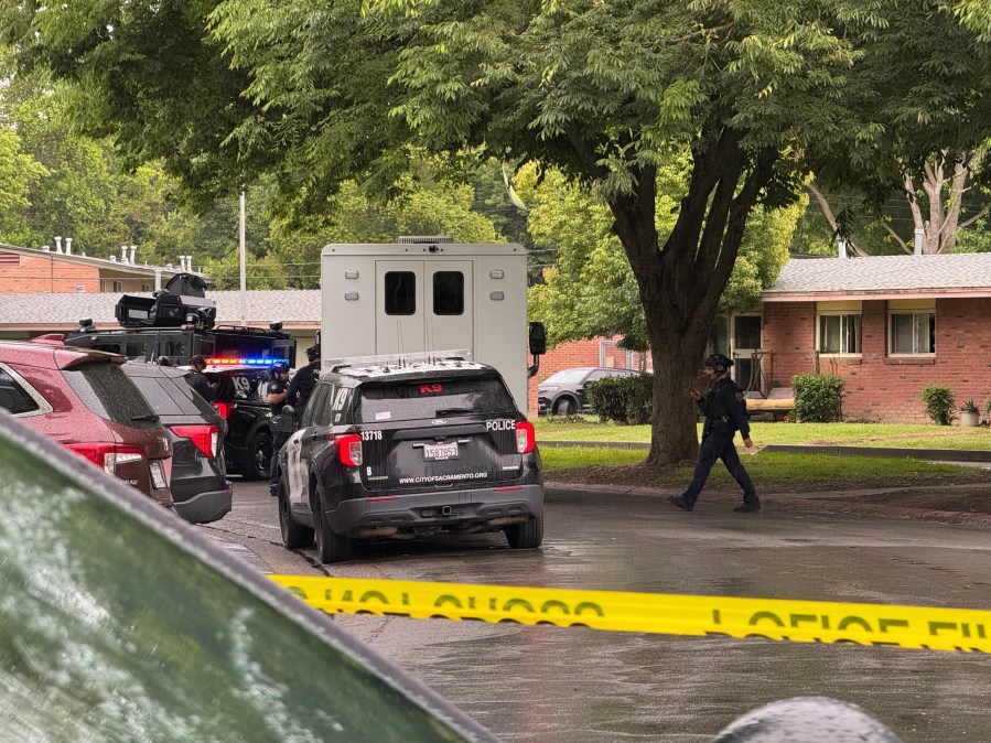 Sacramento police attempting to call suspect out from residence following pursuit
