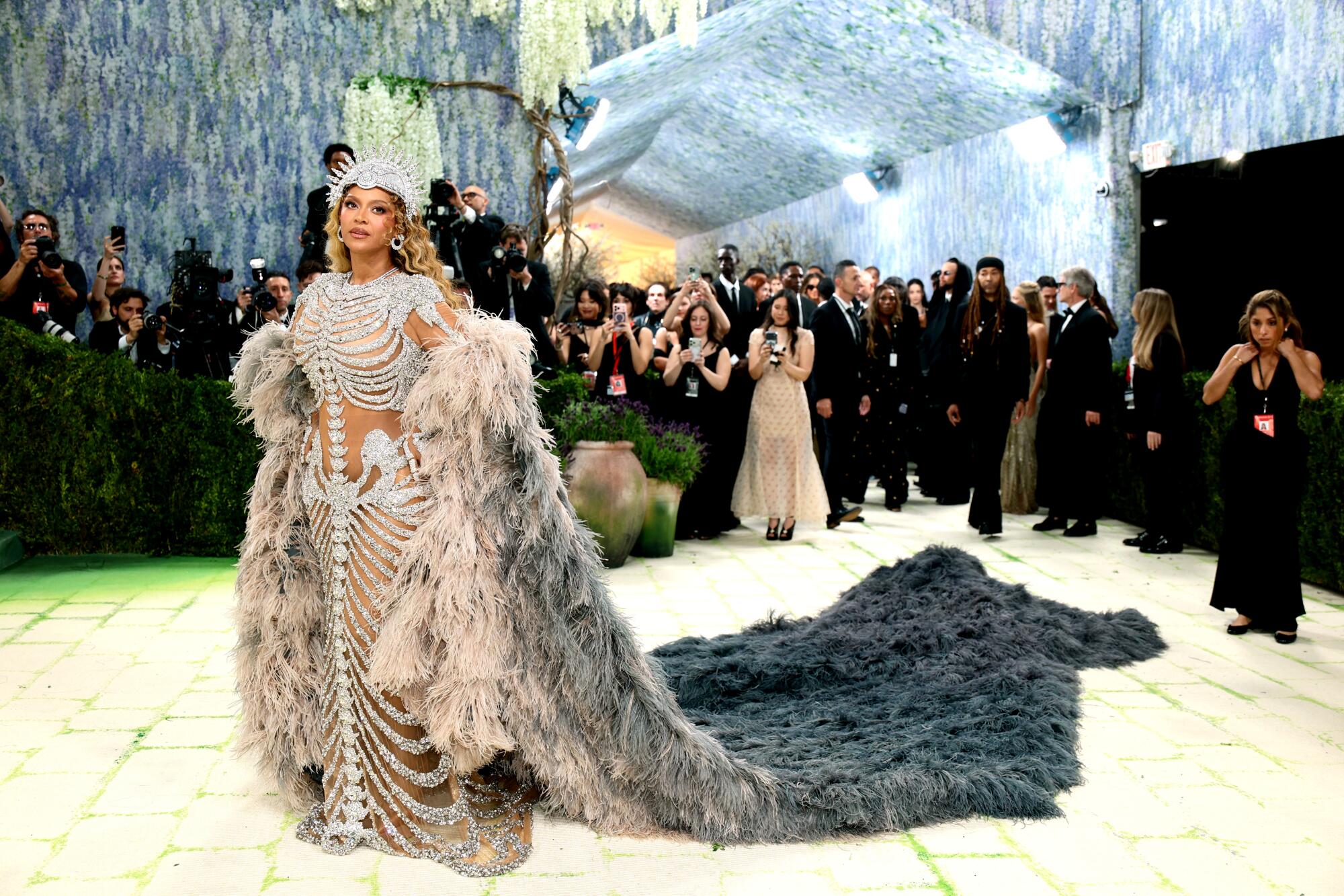Beyoncé, wearing a skeleton-inspired look, poses at the Met Gala. 