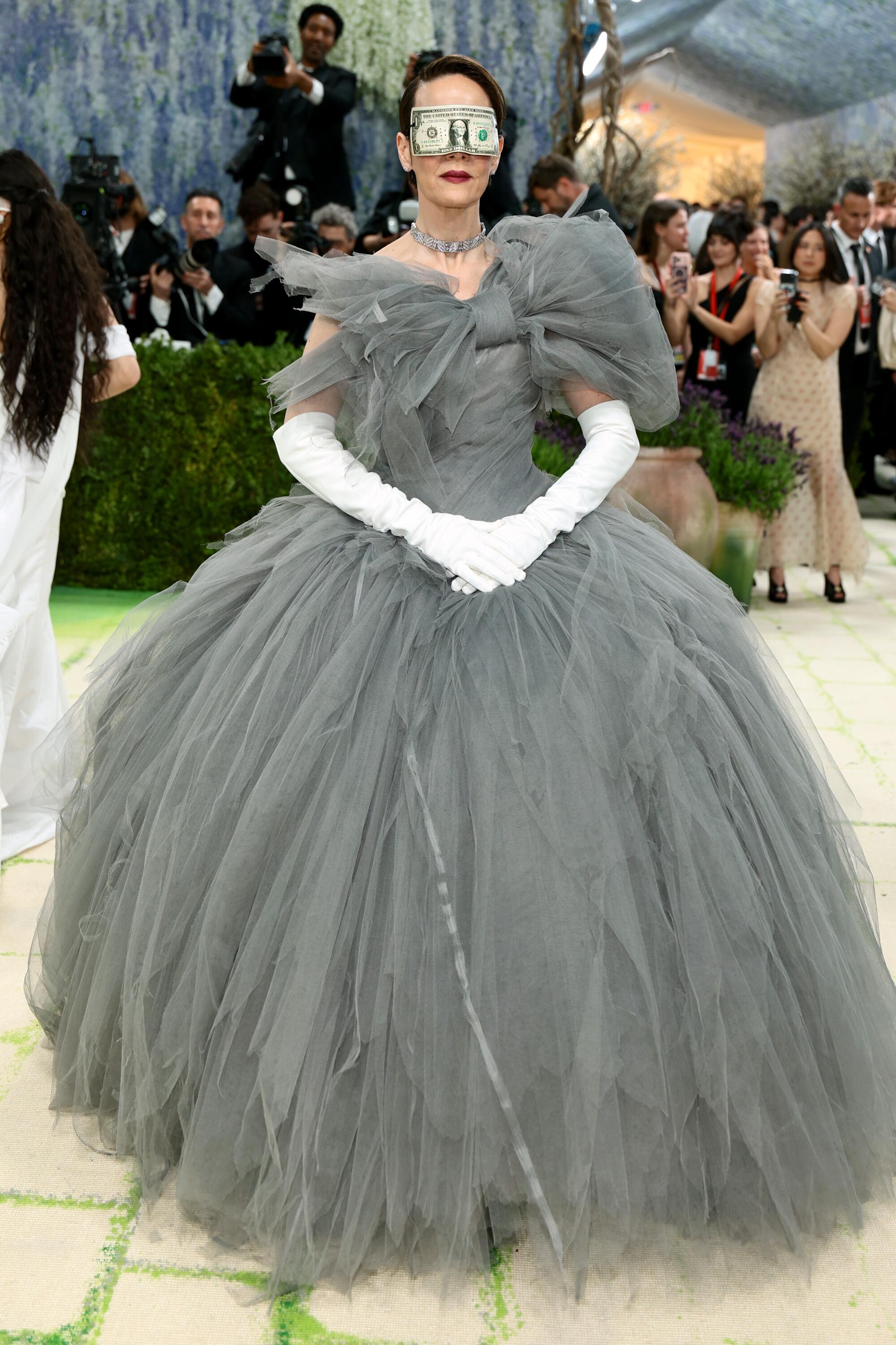Sarah Paulson wears a dollar bill mask at the Met Gala.