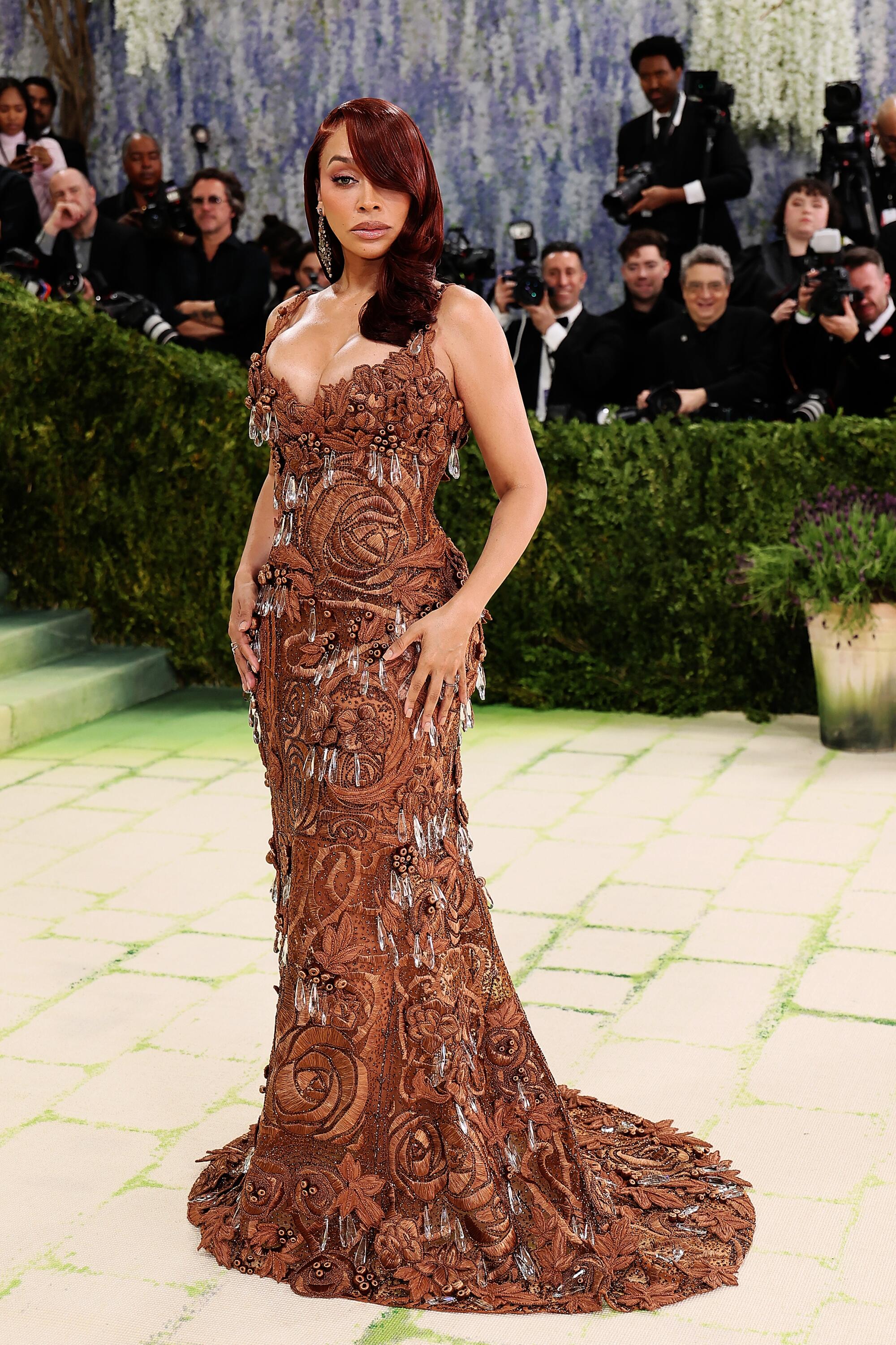 La La Anthony poses at the Met Gala. 