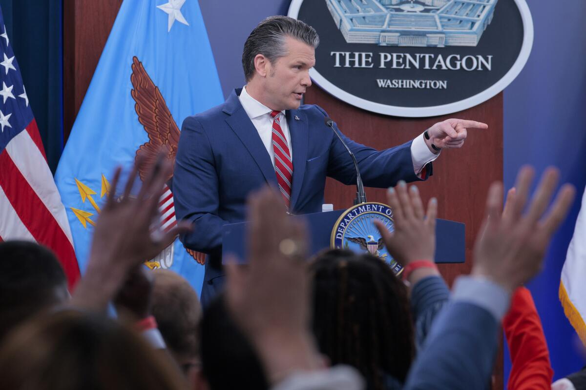 Secretary Pete Hegseth takes questions during a media briefing at the Pentagon