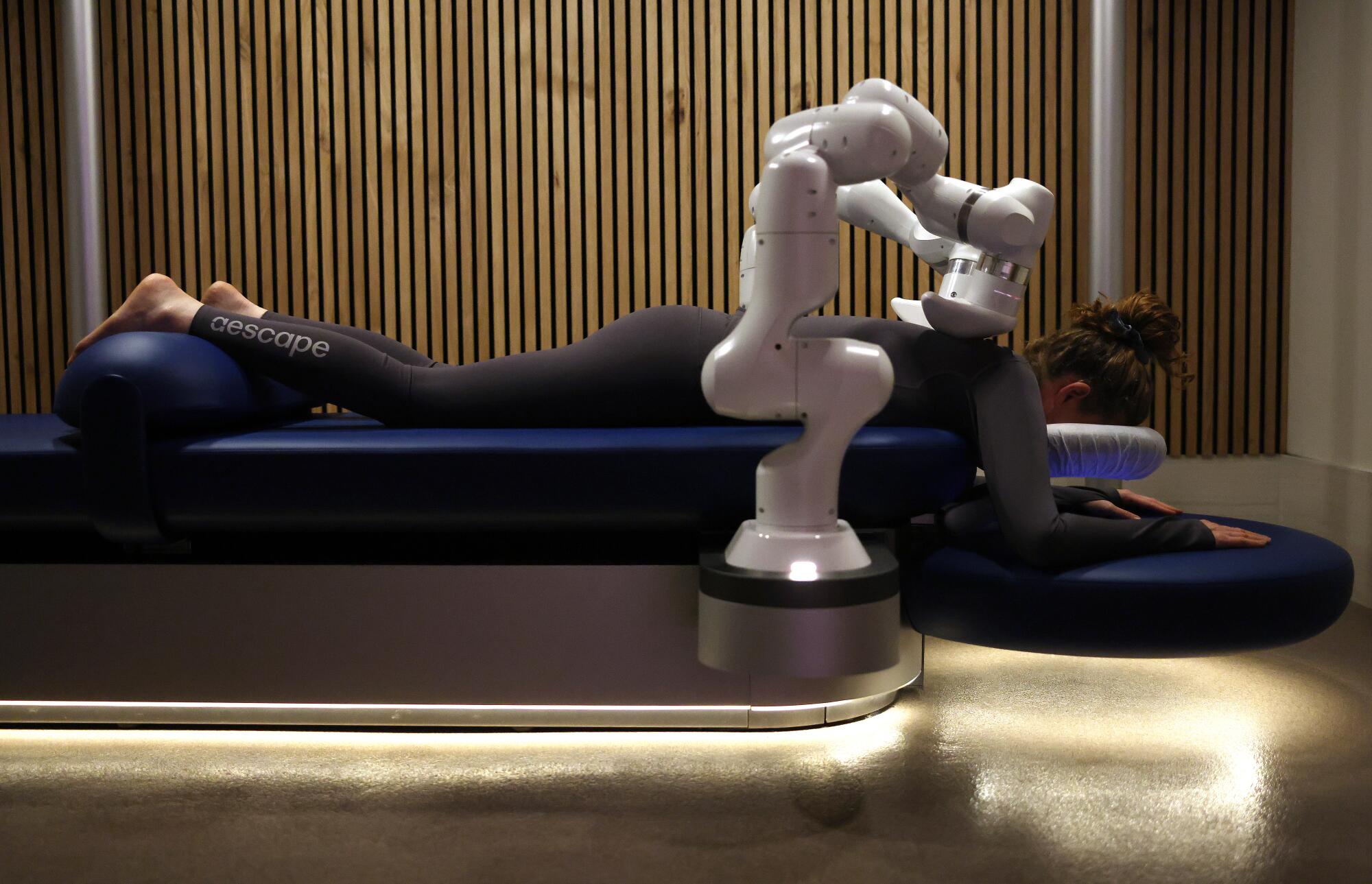Aescape massage robot at Pause Wellness Studio.