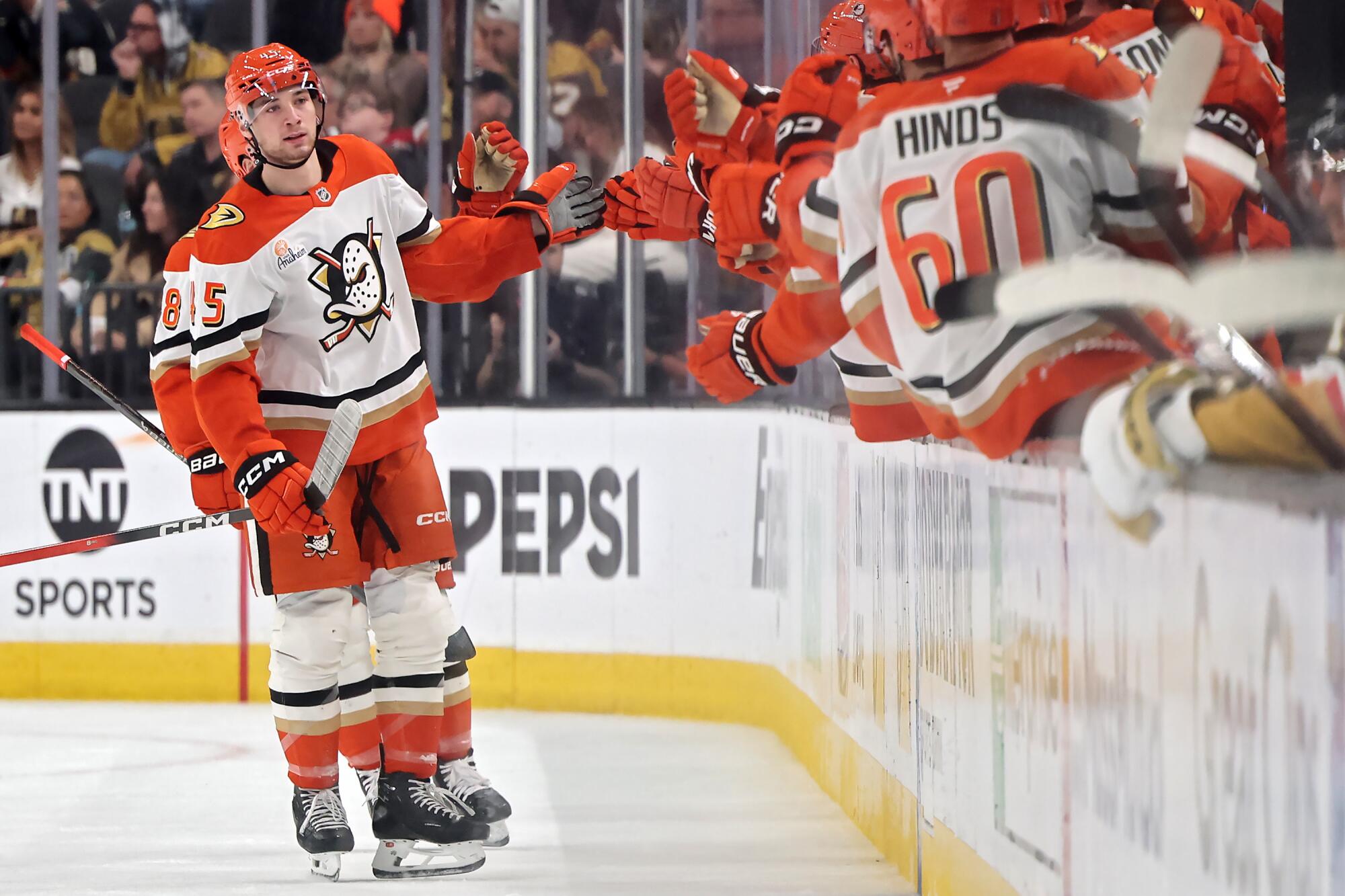 Ducks forward Beckett Sennecke celebrates after scoring in the second period.