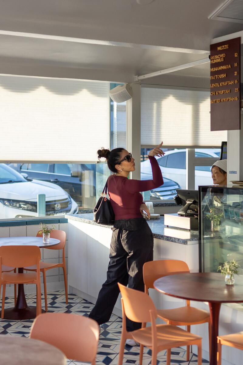Patrons order at the counter and wait for their food at Yerord Mas in Glendale.
