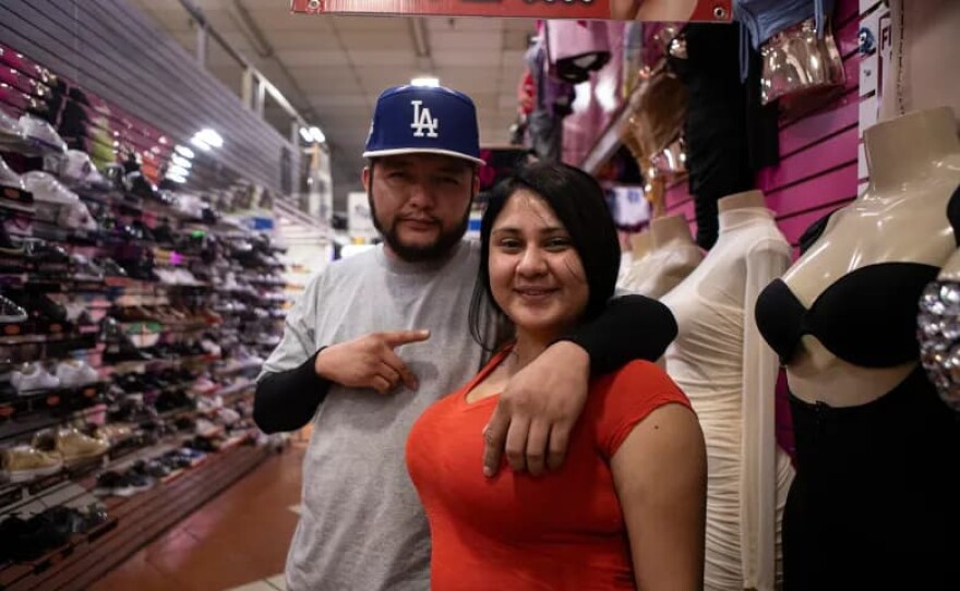 Husband and wife Chiefer Danks and Lorena Herrera at the Mercado Latino Tianguis shopping center in East Bakersfield on April 15, 2026.Larry Valenzuela, CalMatters