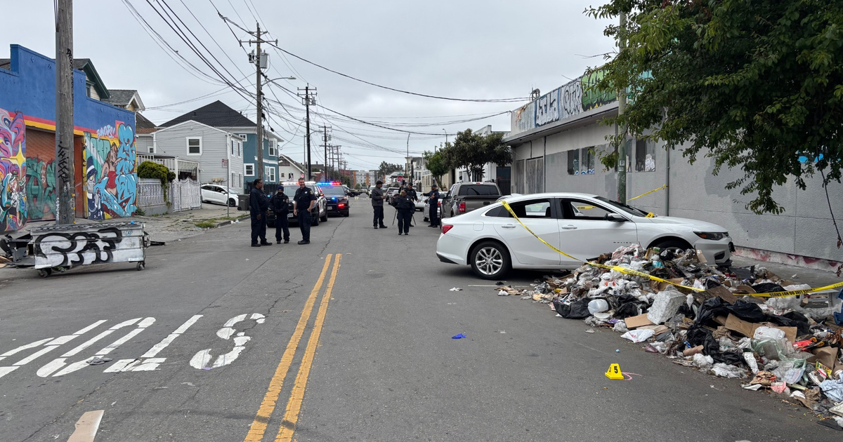 Oakland police shoot suspect after he drags officer in car, pins another