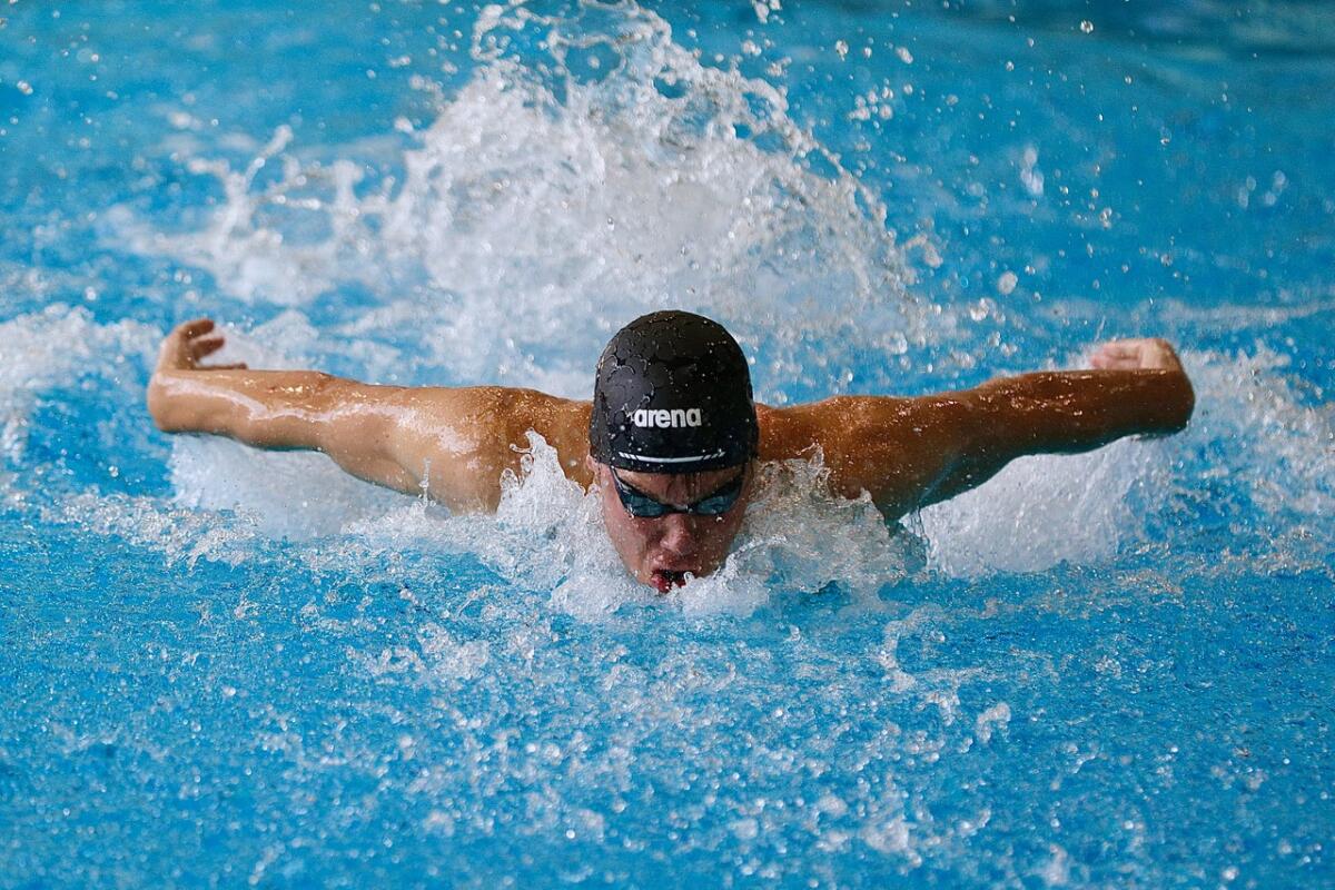 Reseda’s Volodymyr Balaban wins the 200-meter individual medley.