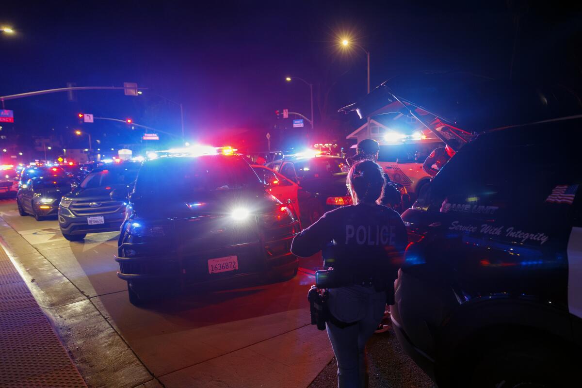 Law enforcement close off streets and lock down a perimeter