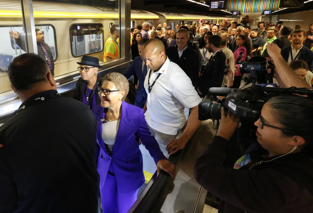 Mayor Karen Bass exits the D Line train at the Metro Wilshire/Fairfax station.