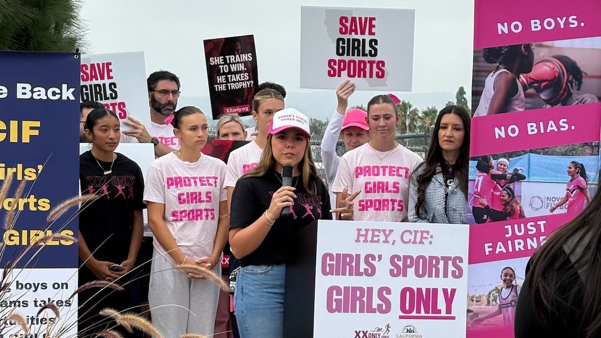 Former NCAA women's soccer player Sophia Lorey gives speech at 'Save Girls Sports' rally.