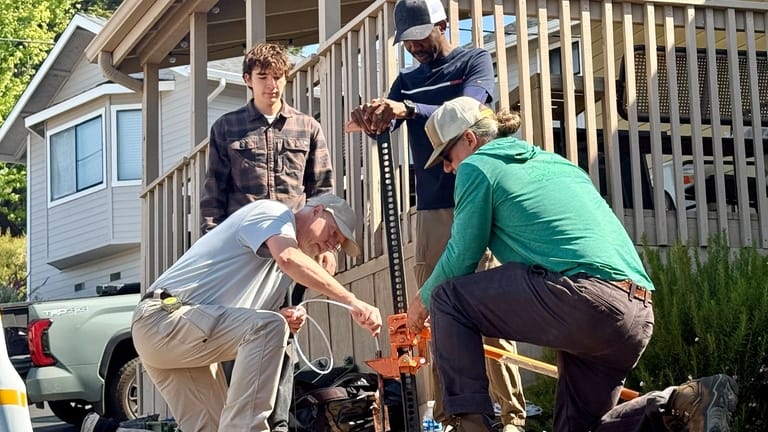 Authorities take samples from the soil Thursday, May 7, 2026,...
