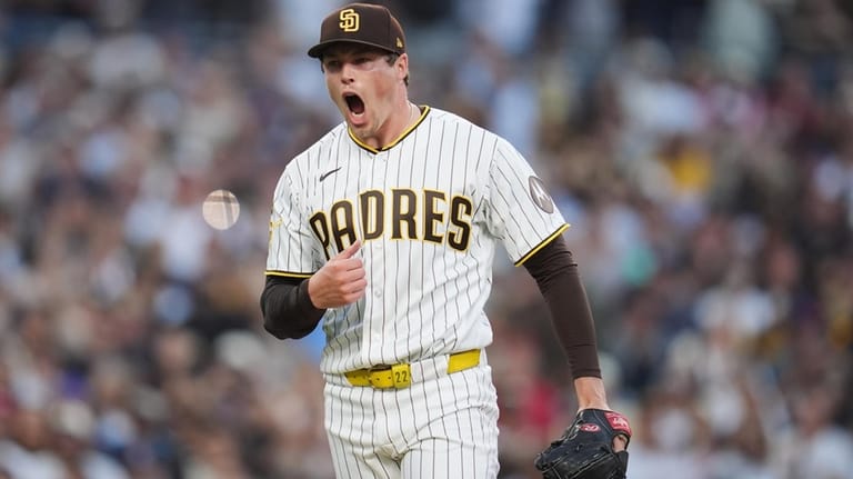 San Diego Padres pitcher Mason Miller celebrates after the Padres...