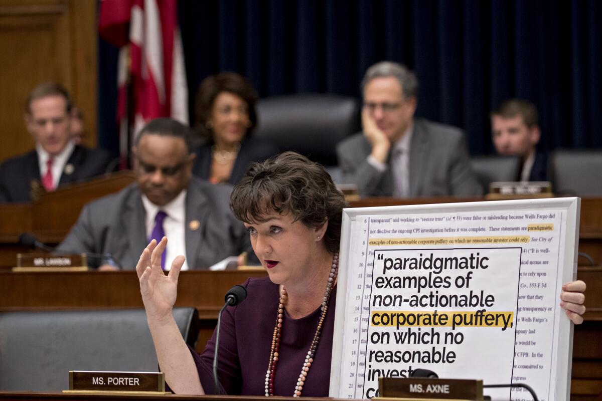 Representative Katie Porter asks a question at a hearing in Washington, D.C.