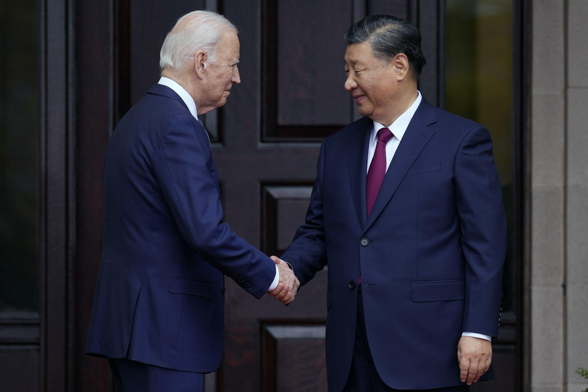 President Biden greets Chinese President Xi Jinping in Woodside, Calif., in 2023.