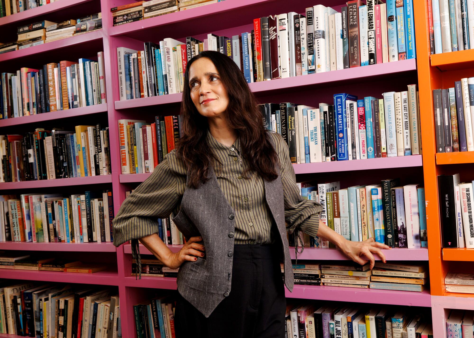 Julieta Venegas stands inside Libros Schmibros in Boyle Heights on Monday, April 27, 2026 in Los Angeles, Calif.