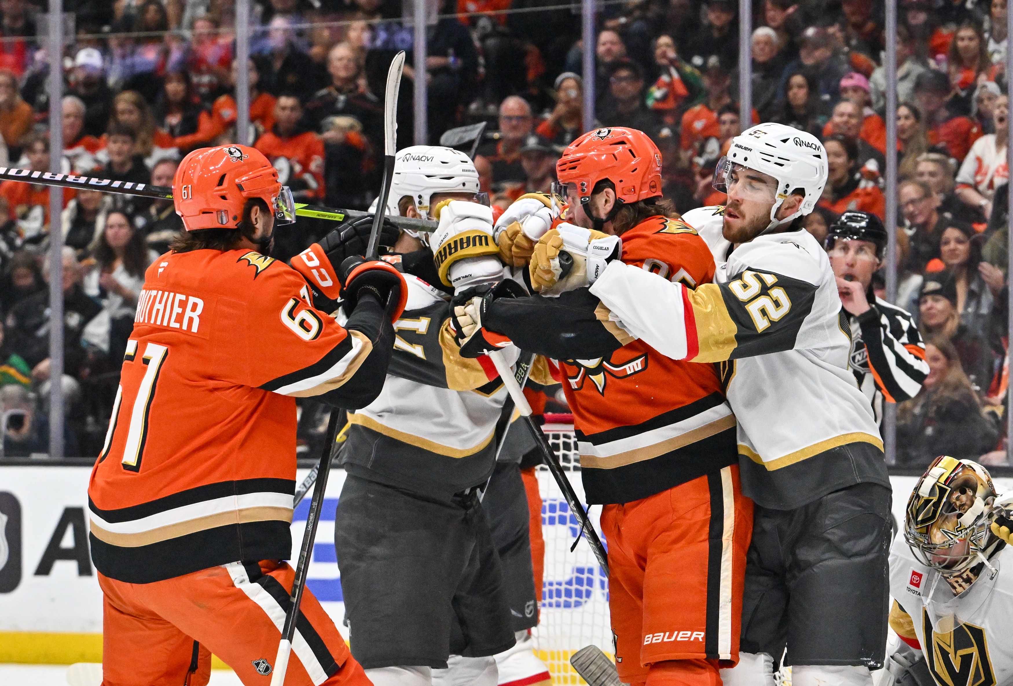 The Ducksâ Cutter Gauthier (61) and Jacob Trouba (65) tussle...