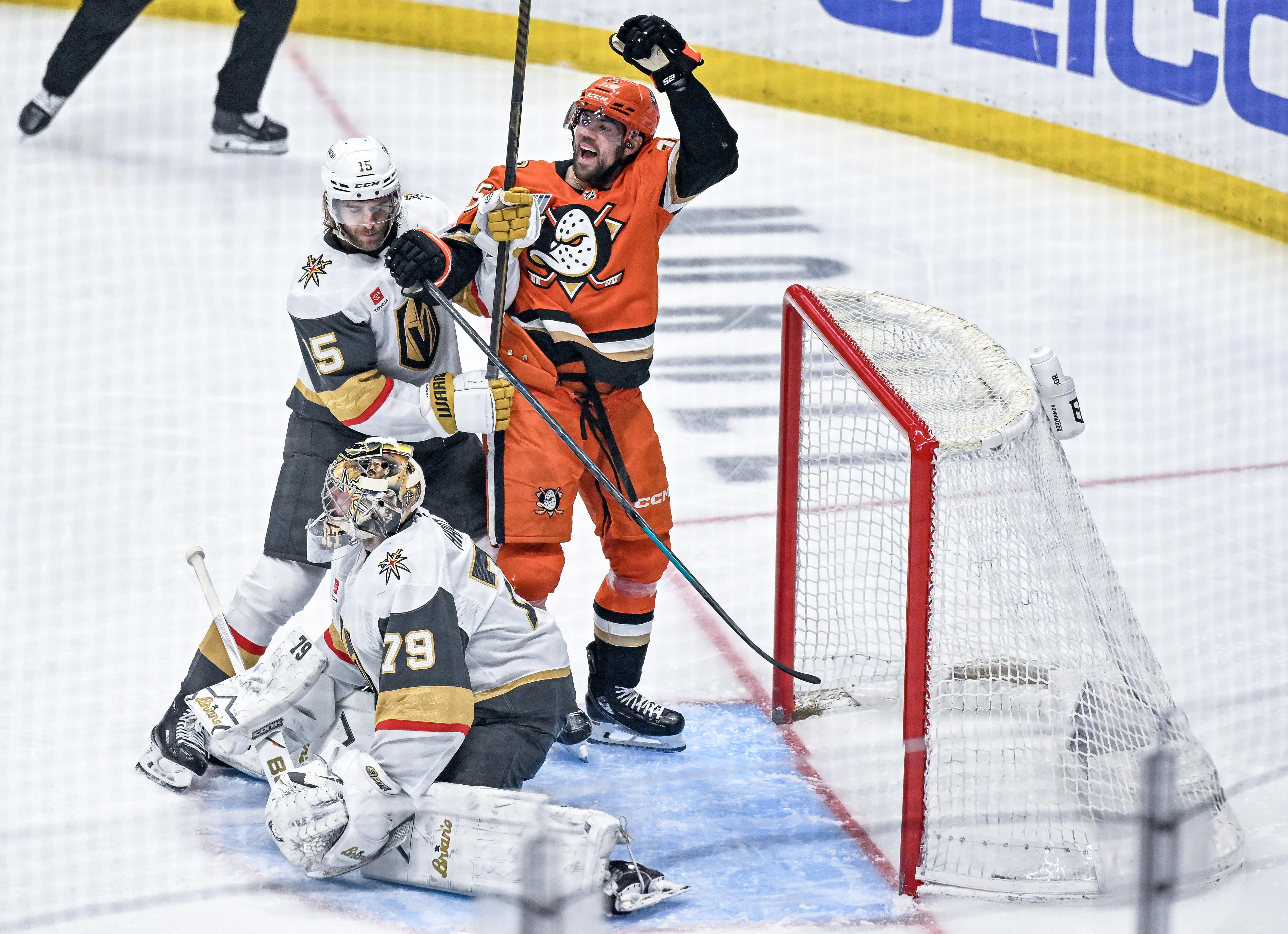 The Ducksâ Ryan Poehling (25) celebrates a goal by teammate...